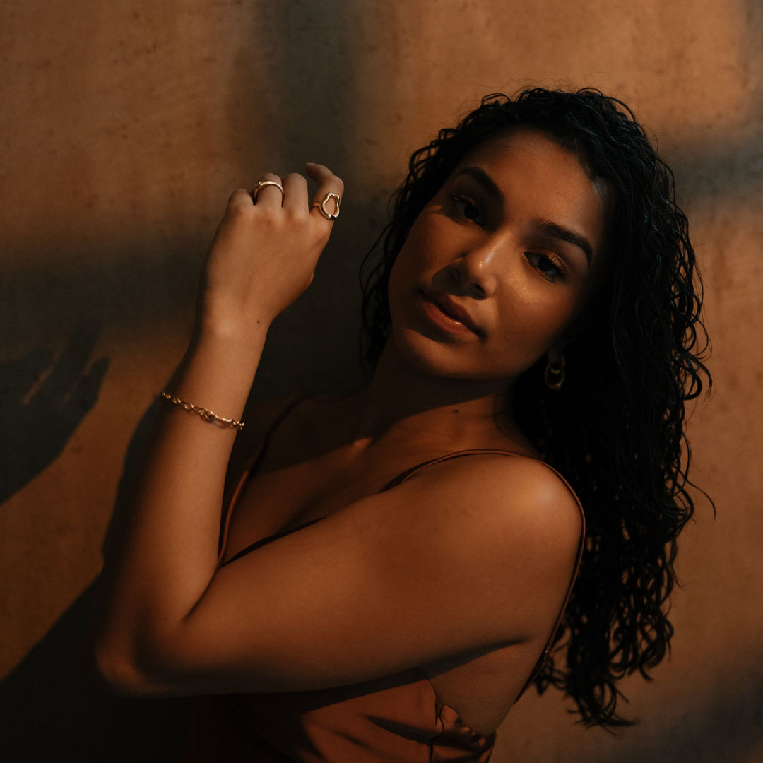 Model wearing THOMAS SABO bracelet and rings