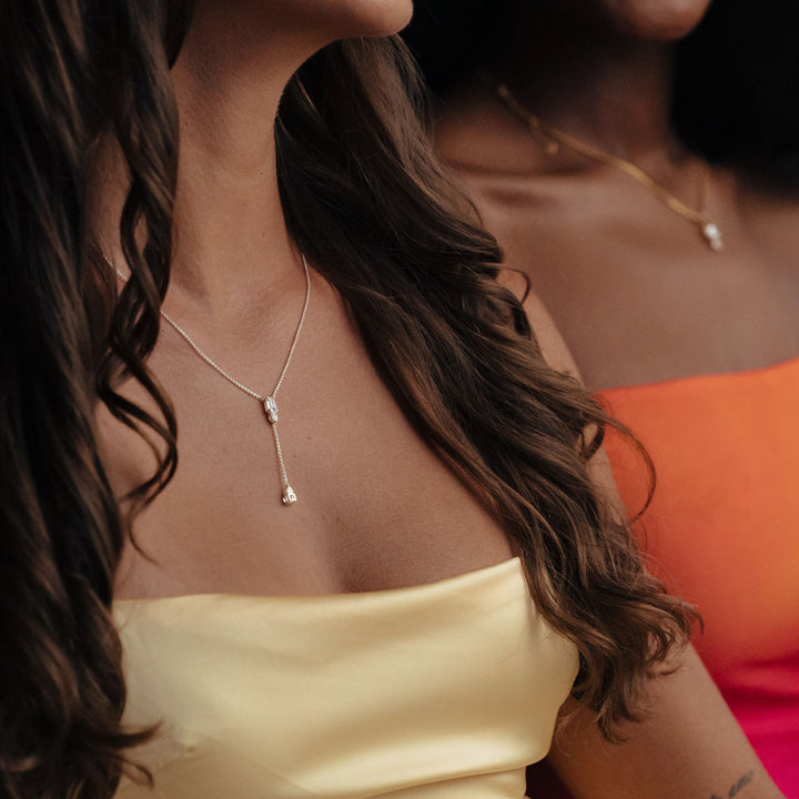 Two models wearing THOMAS SABO yellow gold and silver jewellery