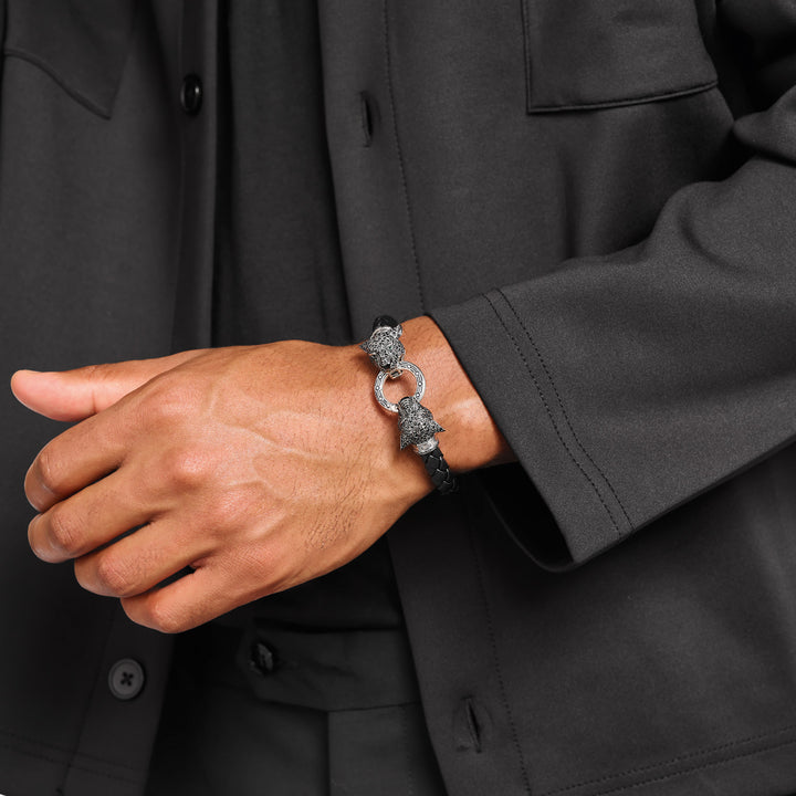 Man wearing THOMAS SABO mens jewellery featuring panther pendants