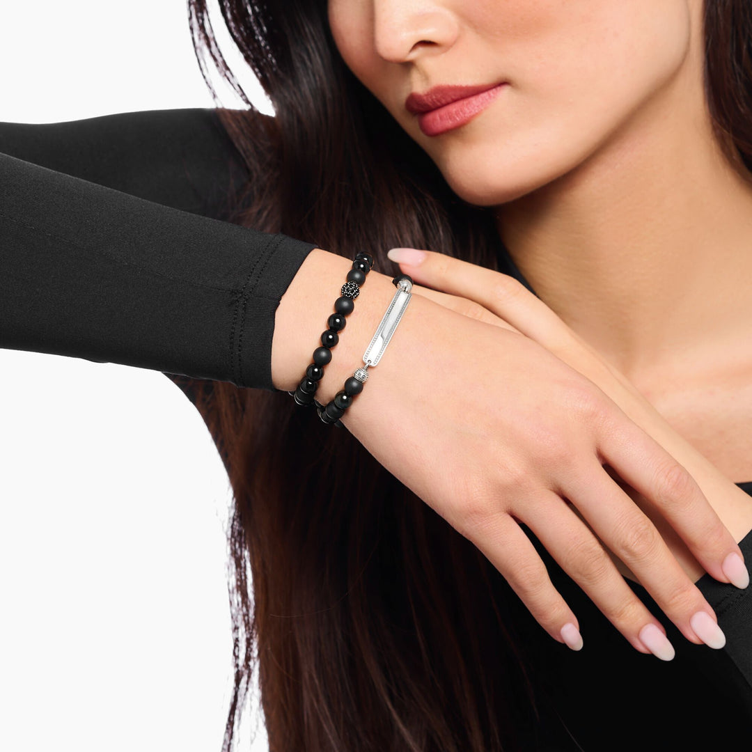 Engraved bracelet with obsidian beads