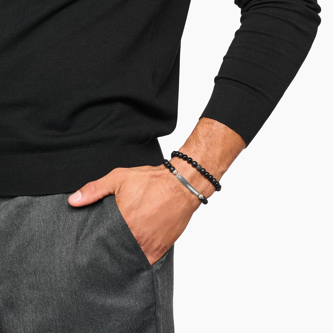 Engraved bracelet with obsidian beads