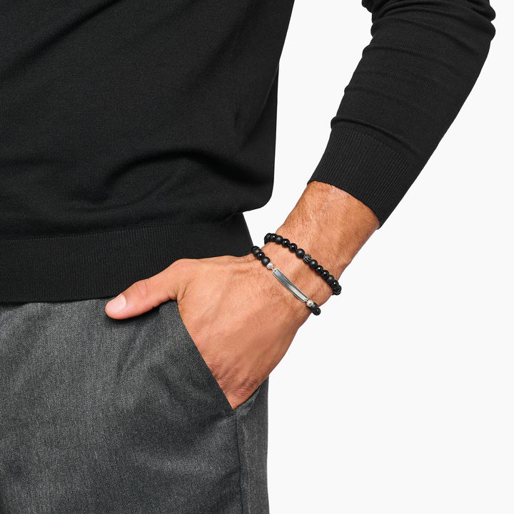 Engraved bracelet with obsidian beads