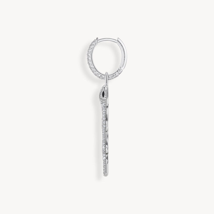 Single hoop earring with white stones