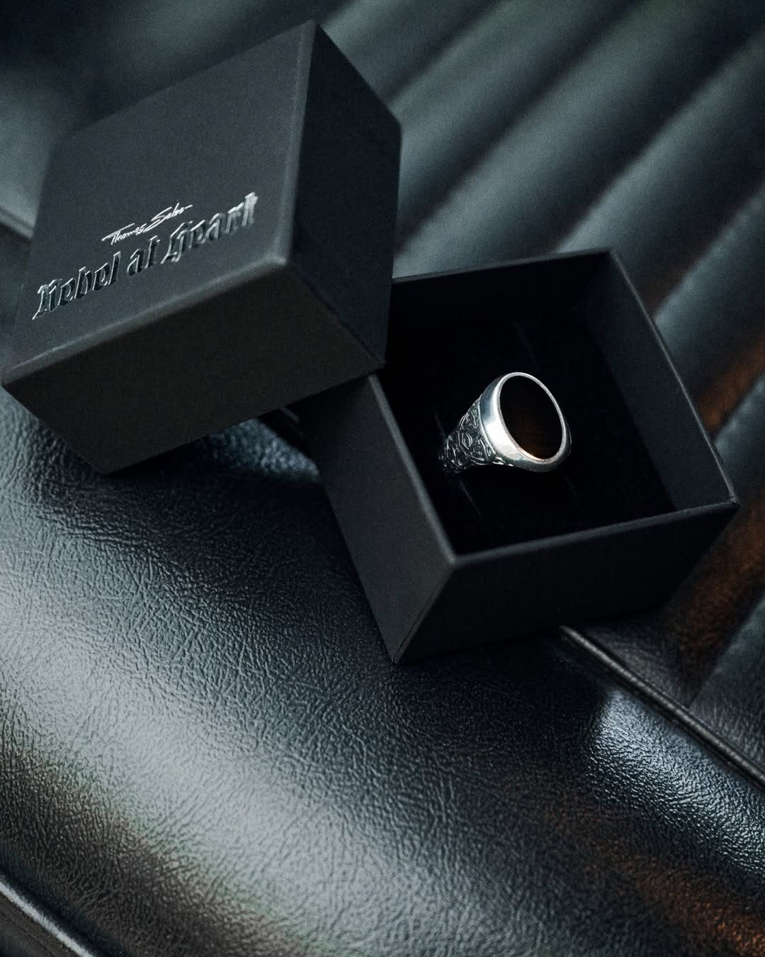 Rebel at Heart ring with black stone in a THOMAS SABO box