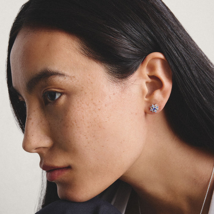 Stud earrings star with blue stones