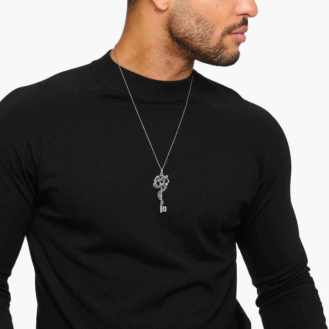 Snake pendant with vintage silver key