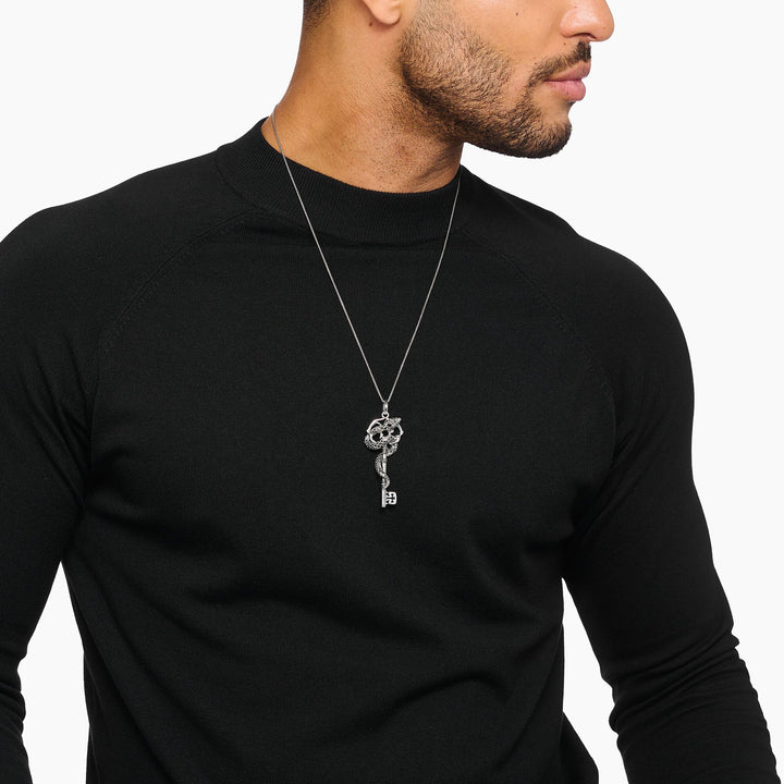 Snake pendant with vintage silver key
