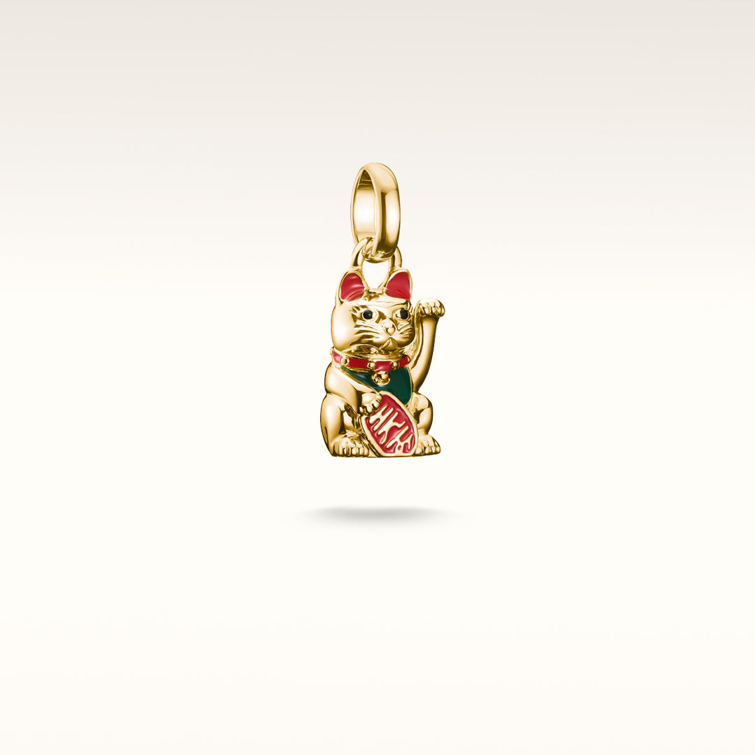Gold-plated THOMAS SABO lucky cat charm with red and green enamel details, raised paw, and coin pendant.